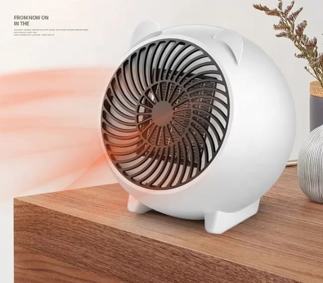 创意可爱卡通迷你快速加热取暖器桌面小型便携家用取暖器家用快速加热电暖器 7